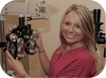 Orthodontist With Eye Exam Instrument