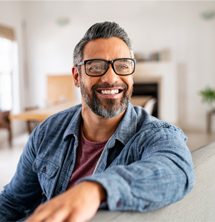 Smiling Male Patient Wearing Eye Glasses